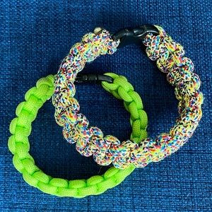 2 rip cord bracelets.  Lime green and Multi